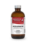 A 2oz bottle of Bristol Finish Accelerator placed against a wooden background.